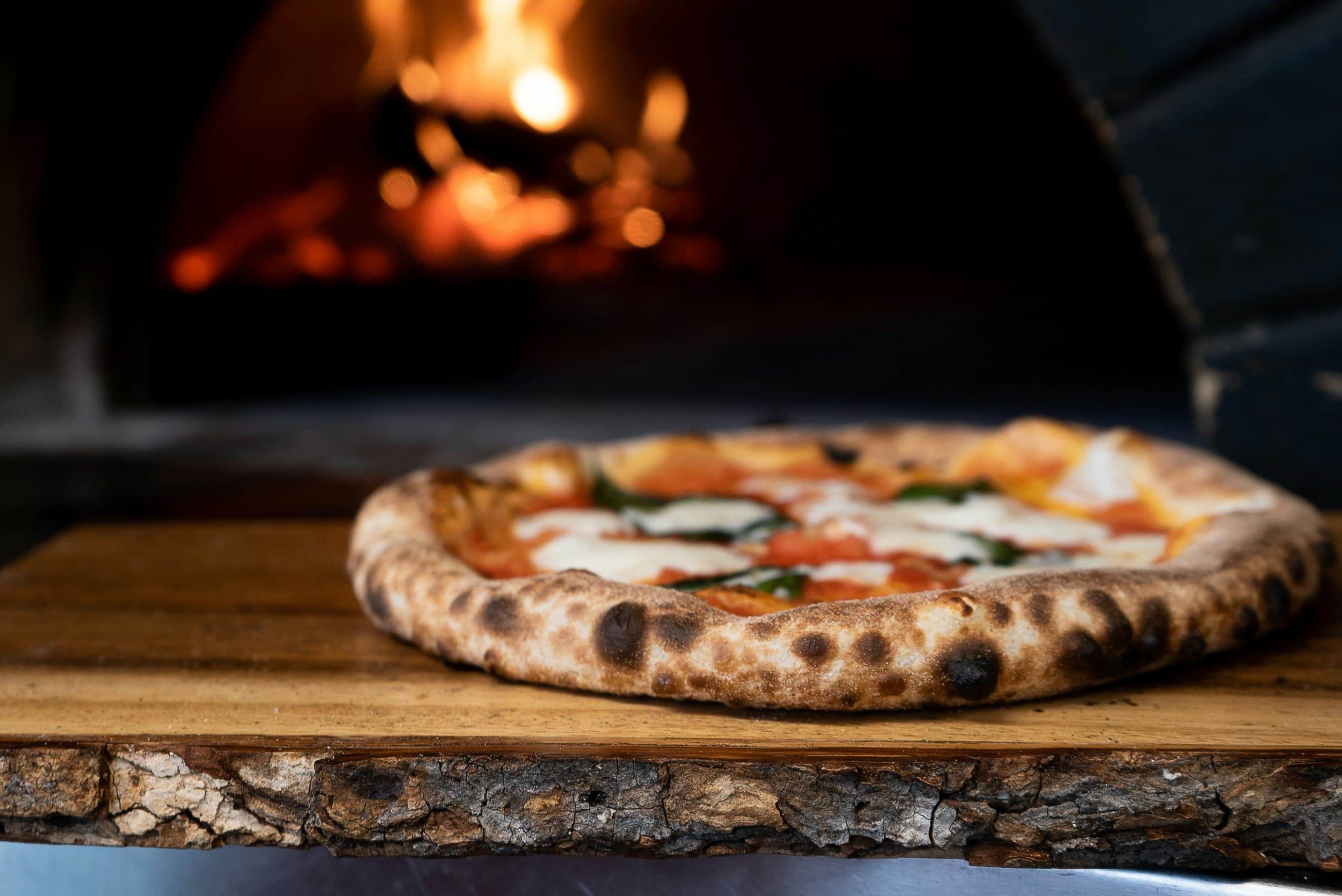 Wood-fired oven with Neapolitan pizza